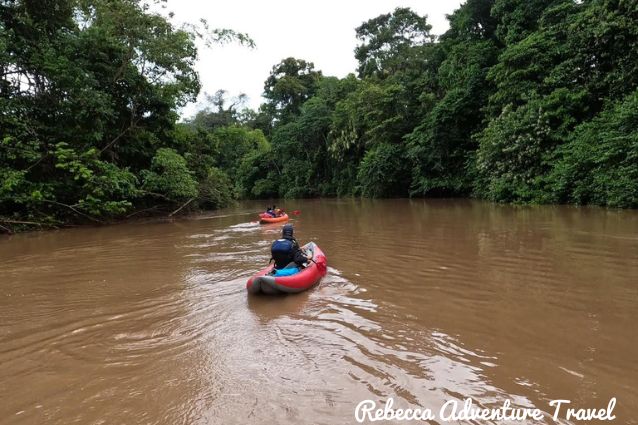 Tourists kayaking on a river in the Amazon 