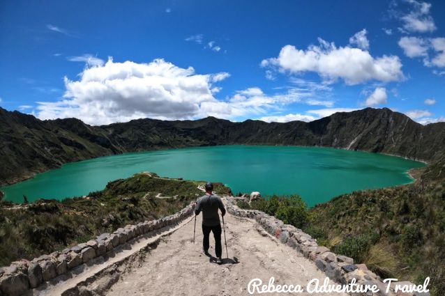 Tourist trekking close to the Quilotoa lagoon. One of the most famous places to go camping in Ecuador